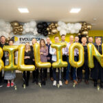 Evolution Staff celebrate 1 billion