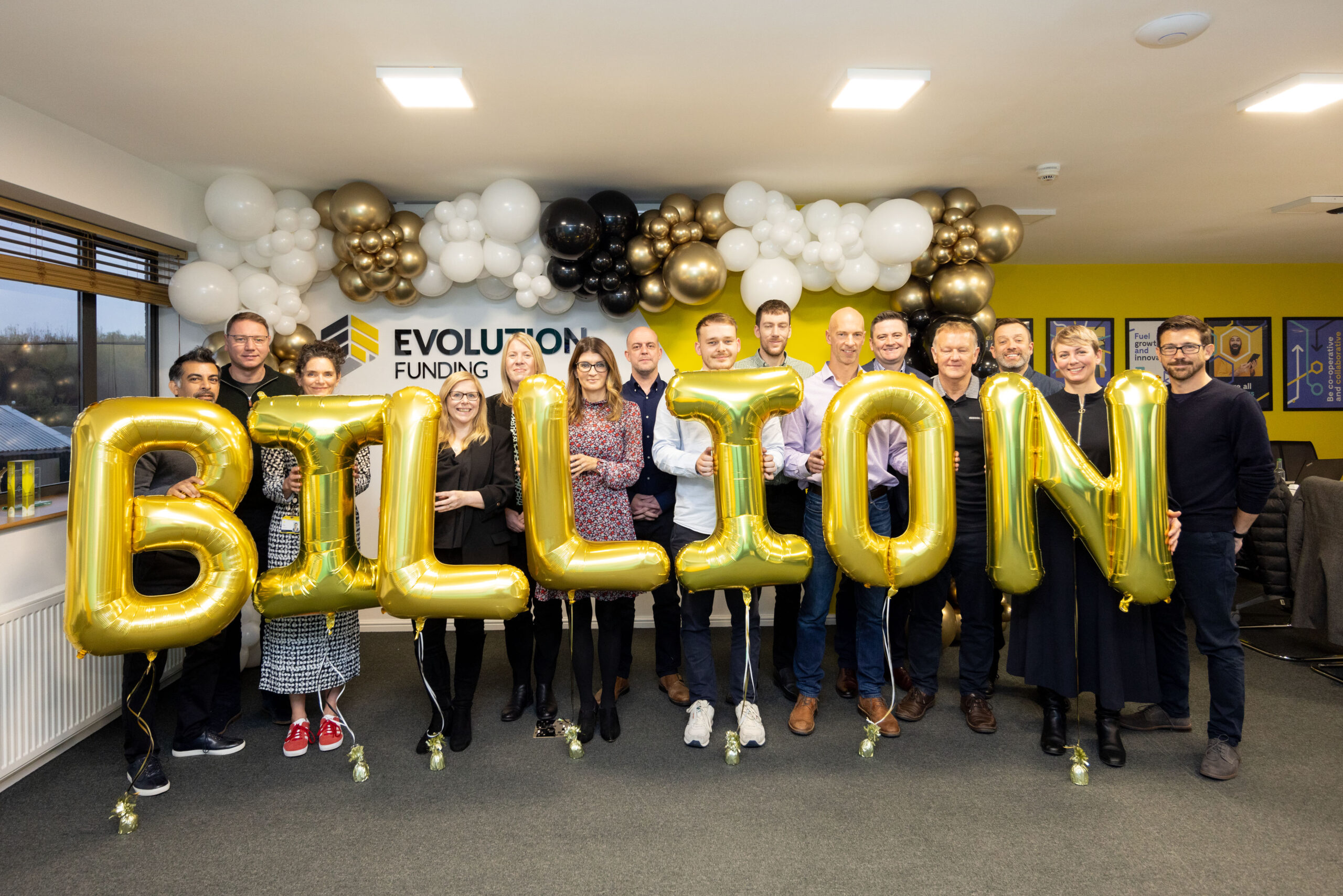 Evolution Staff celebrate 1 billion