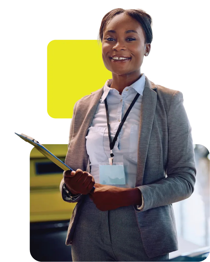 lady with clipboard greeting customers at the car dealership