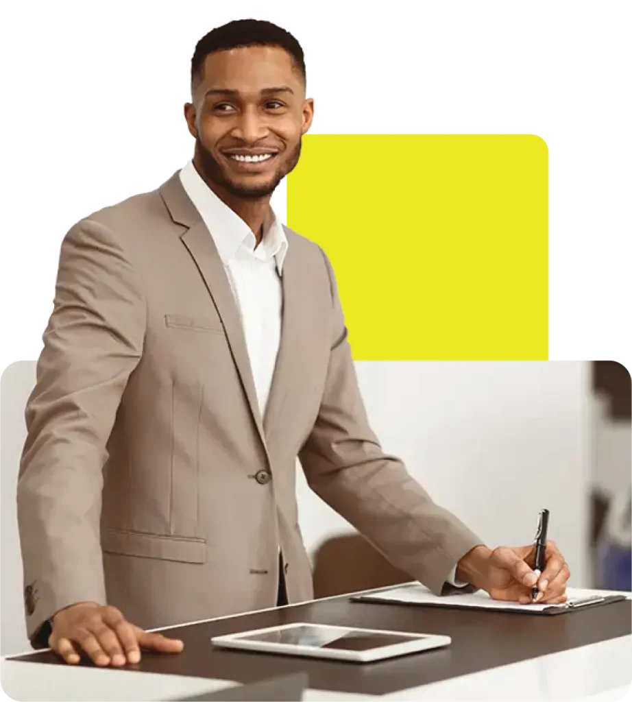 car dealer waiting for customer to complete digital signing