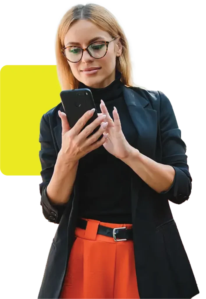 Woman using her mobile device to complete digital signing in the car dealership