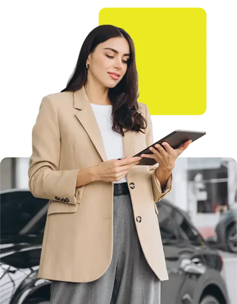 Female car dealer checking car finance applications on portal