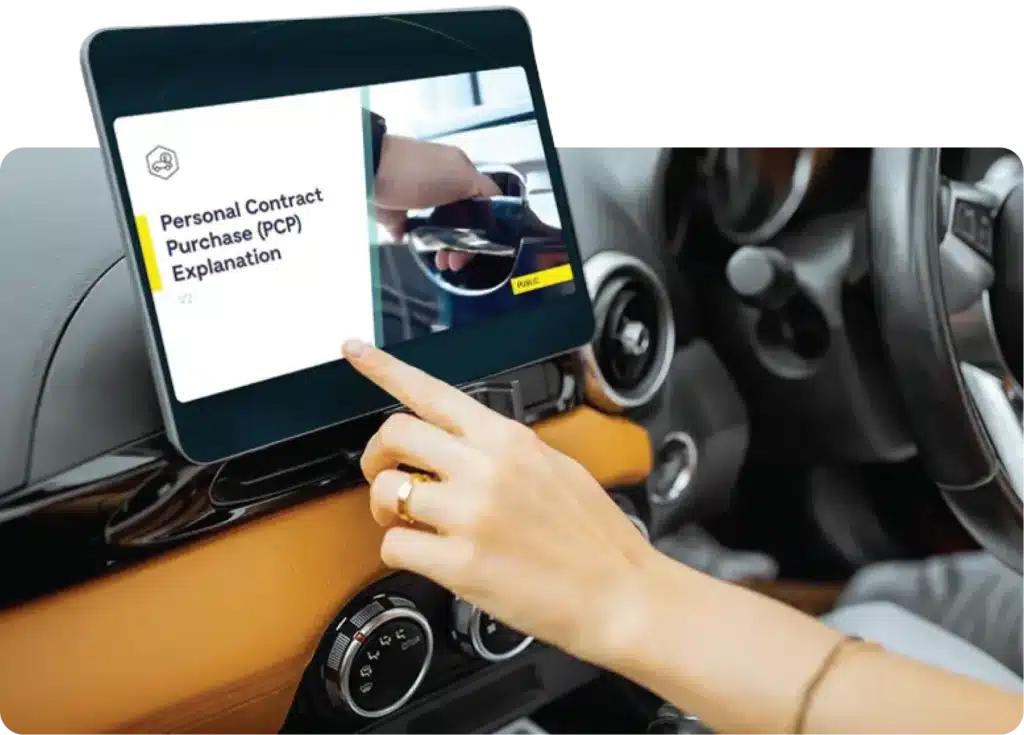 woman watching a motor finance adequate explanation video in her car