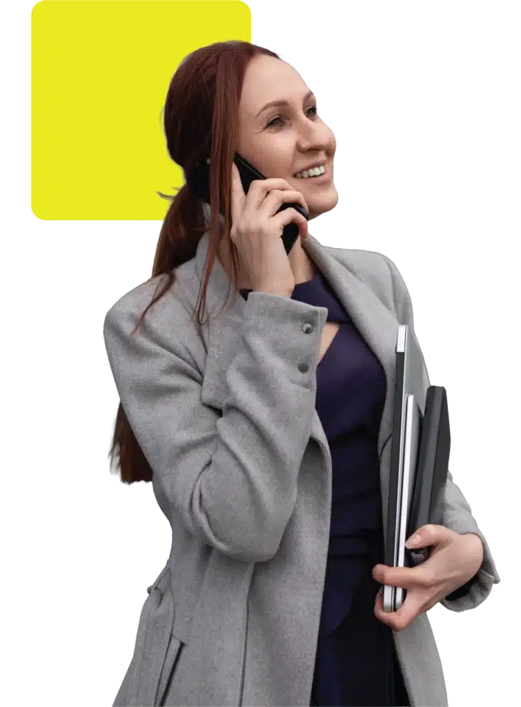 Woman calling her dealer to arrange compliant motor finance on a used car